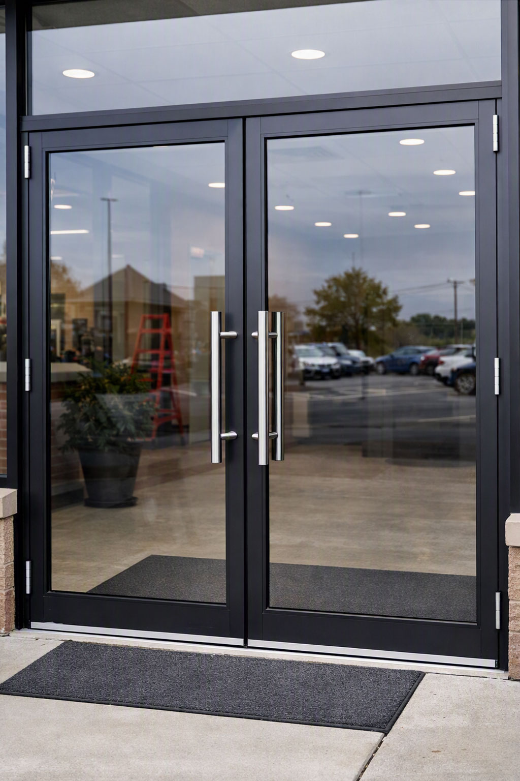 Repaired commercial door glass after replacement